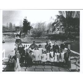 [School Children]-Old hotel in background where school was held