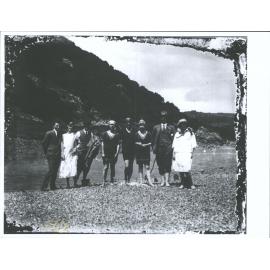 Unidentified group, some in swimming attire