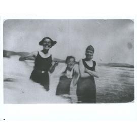 Swimming in the surf, Taieri Mouth