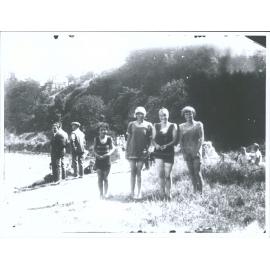 Unidentified group in swimming attire