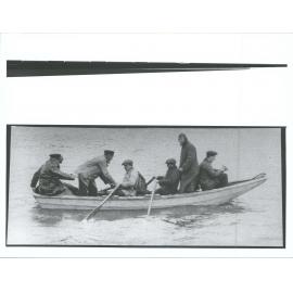 Whalers in a rowboat