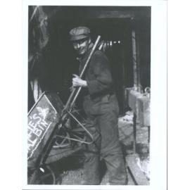 Whaler with wheelbarrow