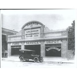 Carson's Garage- Oakland car out front.