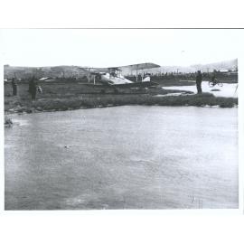 Onlookers and Biplane