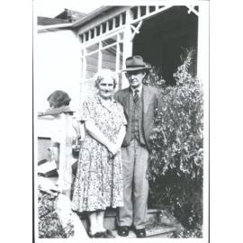 Baxter, Millicent, Amiel Baxter (b. Macmillan Brown), and Archibald McColl Learmond Baxter with Hilary Baxter in background