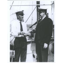 Captain Brown, master of the "Eleanor Boling" and Mr Brophy, manager of the Byrd Expedition.