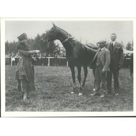 with horse and owners