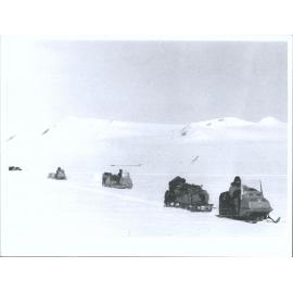 "A toboggan train sets out from a campsite in Northern Victoria Land"