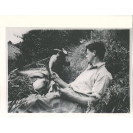 Toss in Greymouth. Goat belongs to Taylors Holding a magnolia bloom