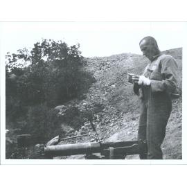 "Walter Cobb With Turkish Machine gun captured by C.Y.C. at Hill 60."