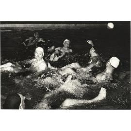 Group playing water polo