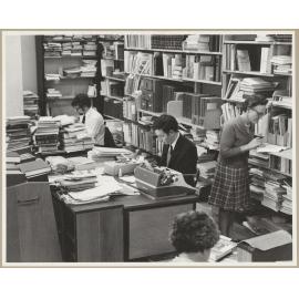 Alan Edwards, Max Broadbent and Lindsay Henderson working in University of Otago library