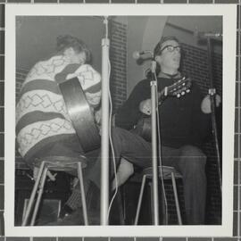 Duo with guitars performing at the 'Folk Proms Concert Capping '67', Union Hall, Dunedin