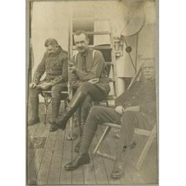 Charles Mackie Begg and two other men on HMNZHS Maheno