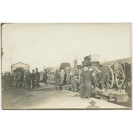Scene of loading or unloading at an unidentified railway station