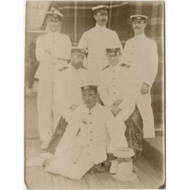 Six men in naval uniform