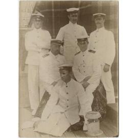 Six men in naval uniform