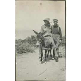 Richard Henderson with a wounded soldier on Murphy the donkey at Gallipoli
