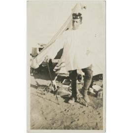 Man in front of a tent