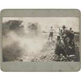 'Some of the Anzac's down at Cape Helles viewing the results of Lizzies Shots into the post at Sedd el Boka'