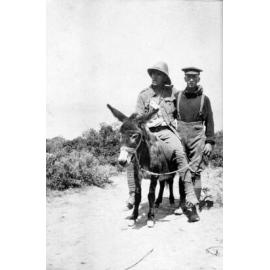 Richard Henderson with a wounded soldier on Murphy the donkey at Gallipoli
