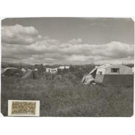 'Te Anau Camp 1953', showing caravans, tents, and cars