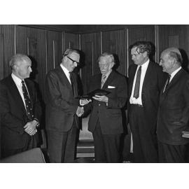 'Presentation to Sir John Walsh of certificate of membership of the List of Honour of the International Dental Federation, made by the Chancellor on behalf of the federation, presented at a meeting of the University Council on October 26, 1971'