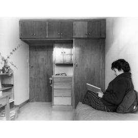 Resident inside her room, Studholme Hall