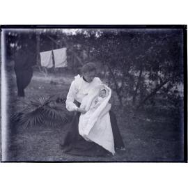 Mrs Margaret McNeur holding her daughter, Jean, Canton
