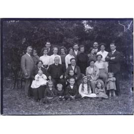 A group of European men, women and children