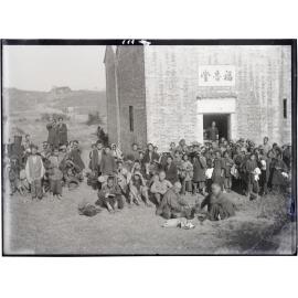 Brick building with people who attended service