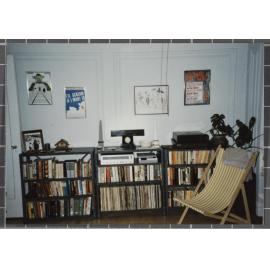 Bookshelf, chair in Robert Lord's apartment, 250 West 85th St, New York