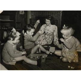 'Threading cotton reels'