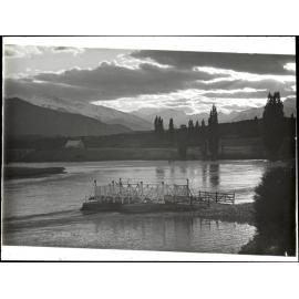 Punt, river, and mountains