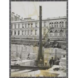 'G.P.O. [General Post Office] Dunedin Lowering first Stanchion into place 19.2.34'