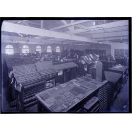 Men working with movable type and showing letterpress drawers, Coulls Somerville Wilkie, Crawford Street, Dunedin