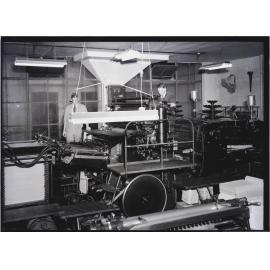 Two men and printing press, Coulls Somerville Wilkie, Crawford Street, Dunedin