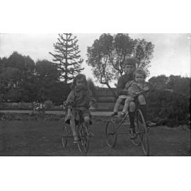 Alison McGeorge on bike, Fred on bike holding Vic