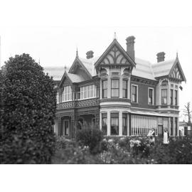 Kawarau [house] with gardener in foreground