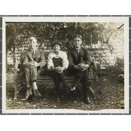 James Courage and two unidentified people