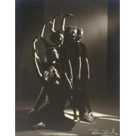 Women in dance pose, right arm raised [Brian Brake photographer]