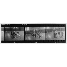 Film strip showing three dance formation images