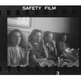 Four people sitting and eating