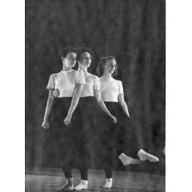 Three dancers facing front/right