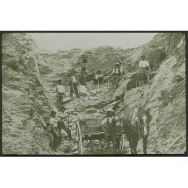 The shifting of rocks from a cutting