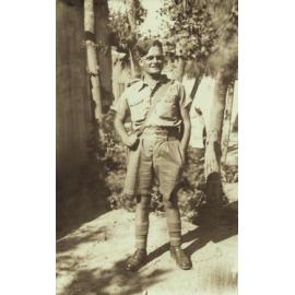 Noel Hulme standing by tree