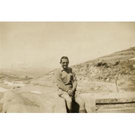 Noel Hulme sitting on wall