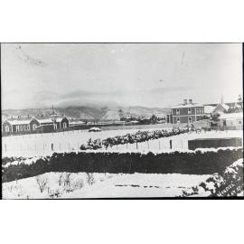 'School, church and manse under snow 27 May [1895]', Mosgiel
