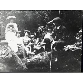 Unidentified group in informal forest setting, possibly associated with Mosgiel Presbyterian Church