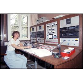 Elizabeth Purdie at Eihudie switchboard in audioconference control room